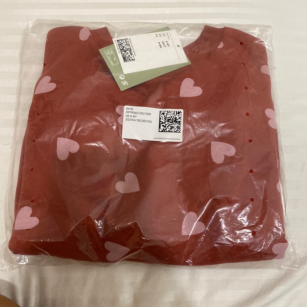 Brand new girls long sleeve sweater.